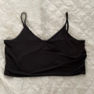 Women’s black spaghetti strap short top by divided size large silky material